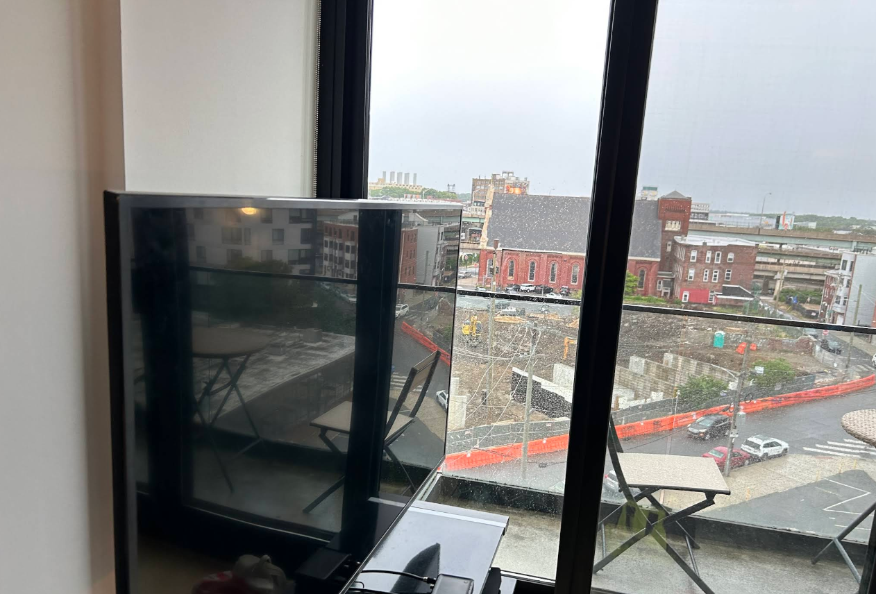Display installation near floor-to-ceiling windows in high-rise